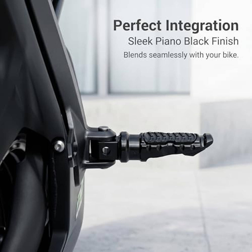 Black motorcycle foot peg with textured grip and mounting bracket, sleek piano finish
