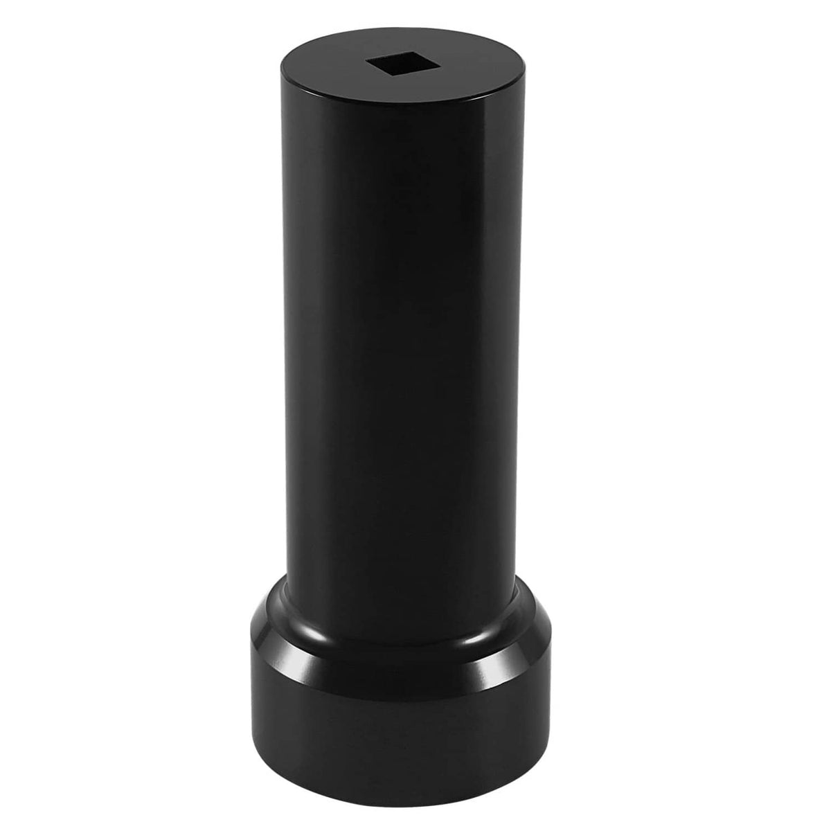 Black threaded spacer piece with central bolt hole, matching mainshaft sprocket lock nut tool