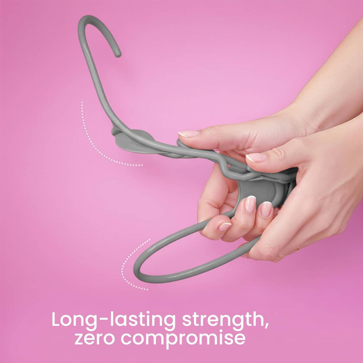 Gray plastic hanger with curved hook, hands gripping for secure hang