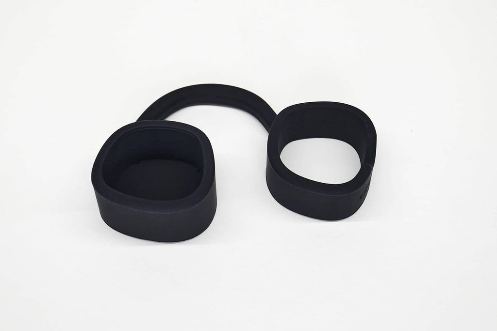 Pair of black silicone charger cap protector rings with interior opening