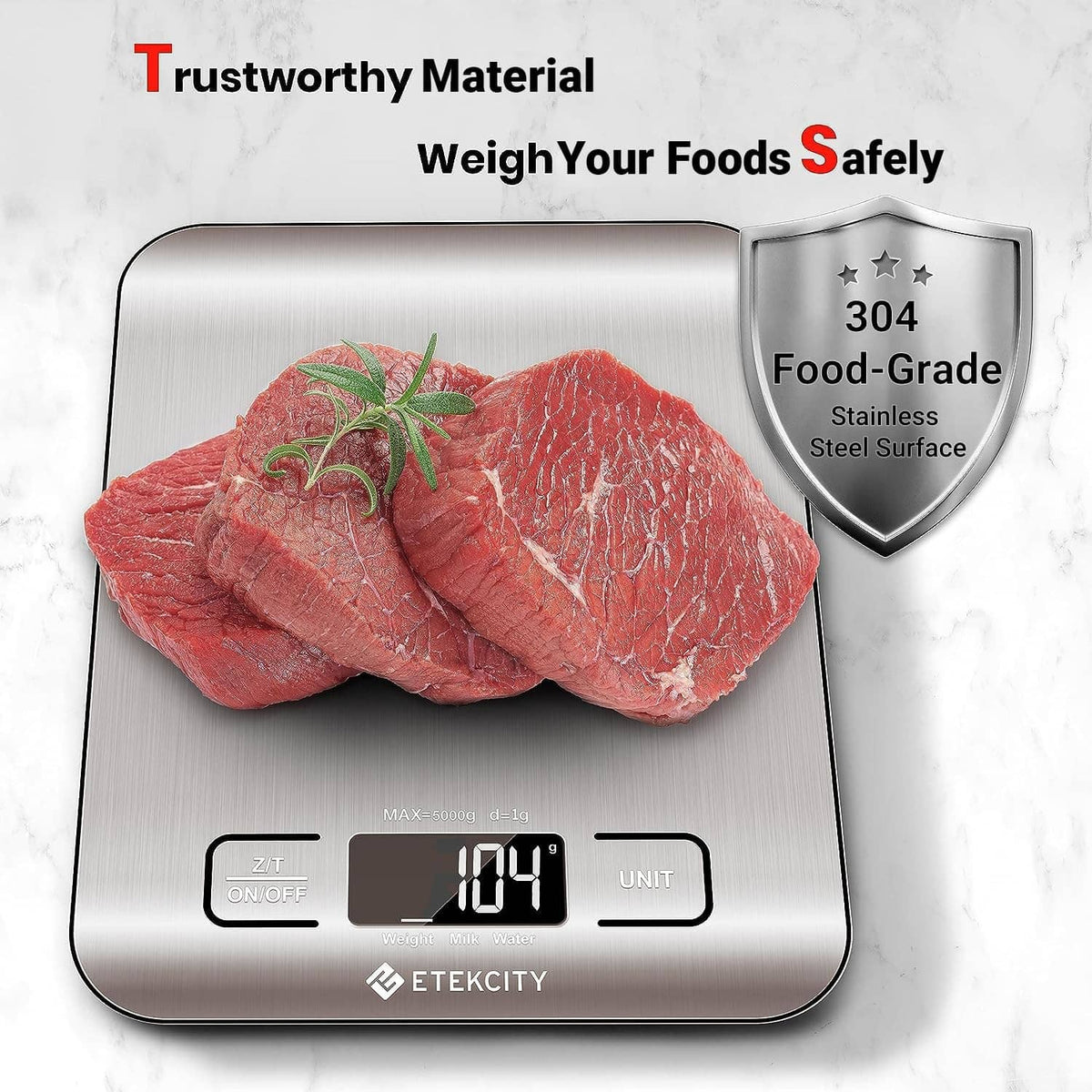 Digital kitchen scale with stainless platform and raw beef on top