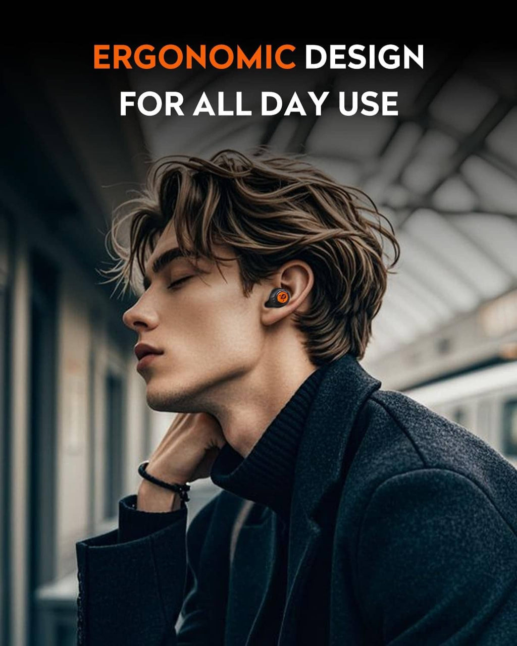 Black earbuds with orange ring, worn in ear for comfortable everyday fit