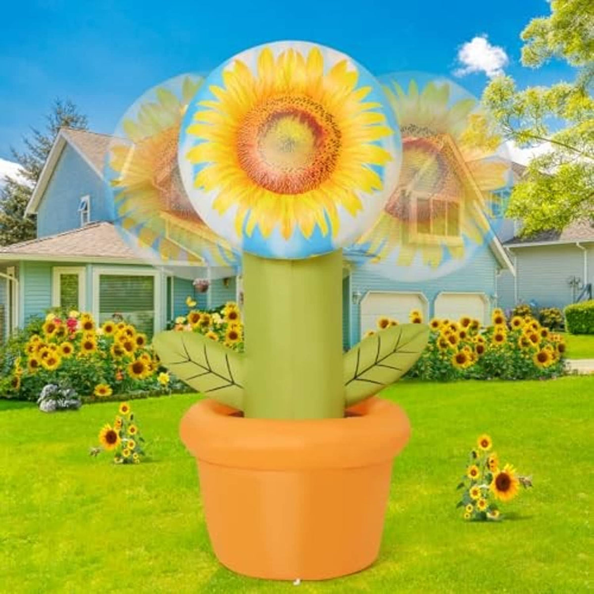 Inflatable sunflower outdoor decoration with bright yellow petals and green stem in orange pot