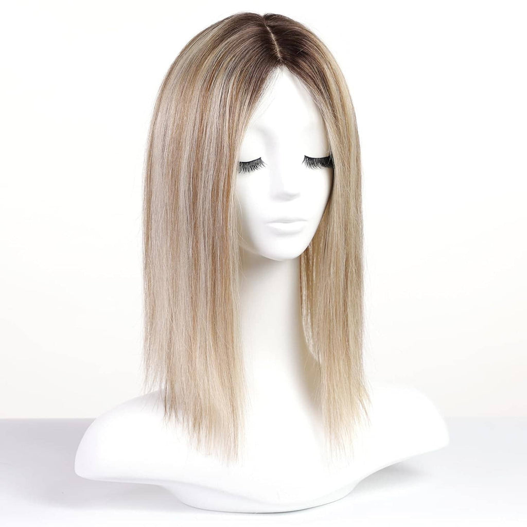 Straight light blonde hair topper with long length, center part on mannequin