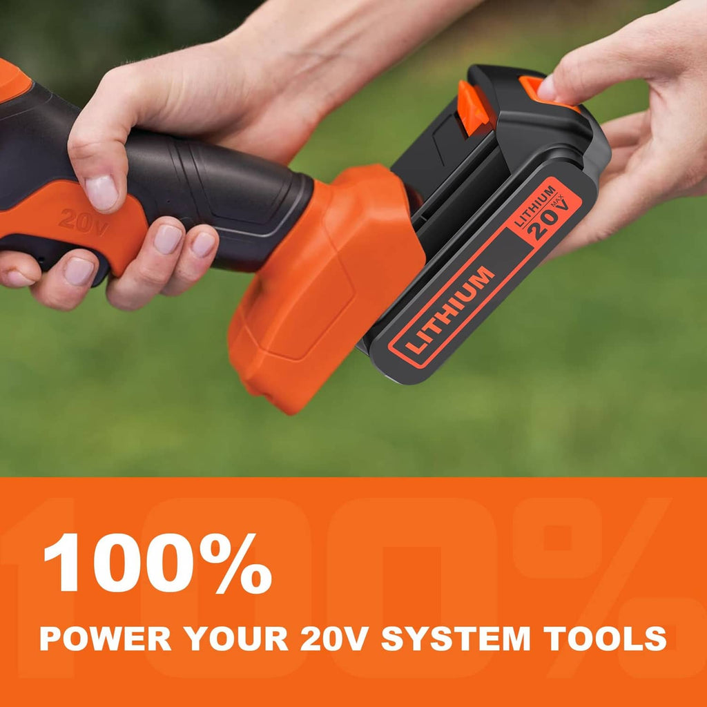 Hands holding a black and orange 20V lithium battery pack