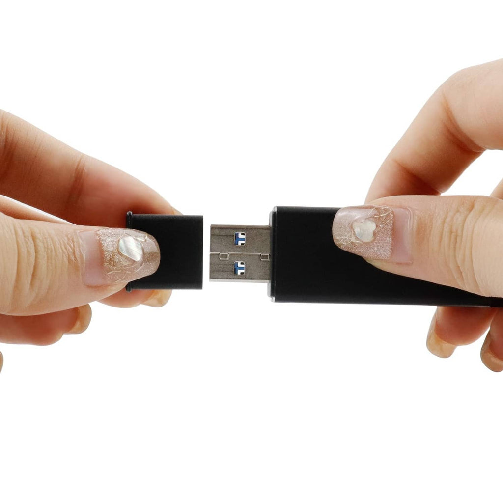 USB Type-A male dust cap being pressed onto a USB plug, black plastic