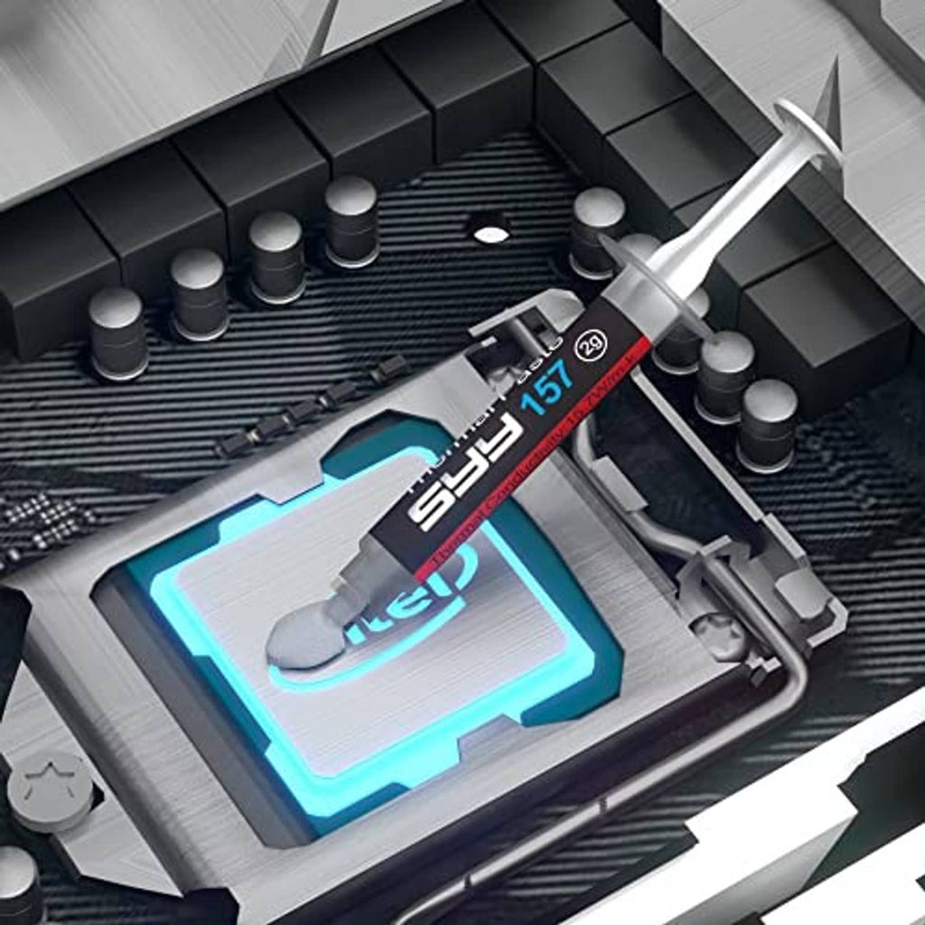 Thermal paste syringe and spatula applying paste on a CPU socket surface