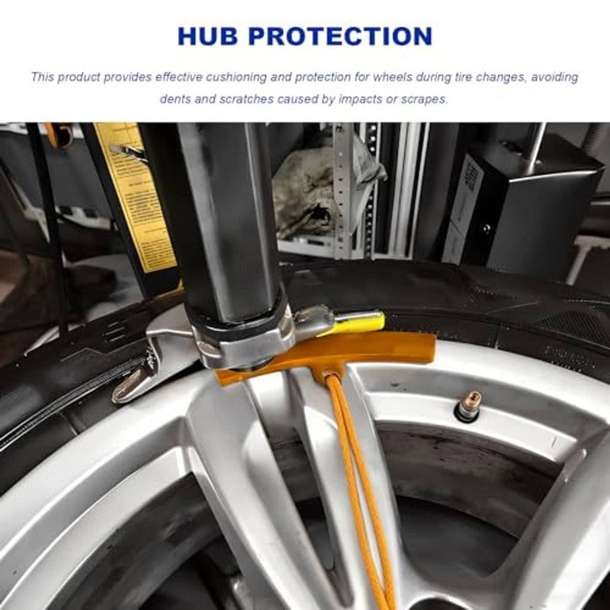 Orange rim protector with yellow cord secured along the wheel rim