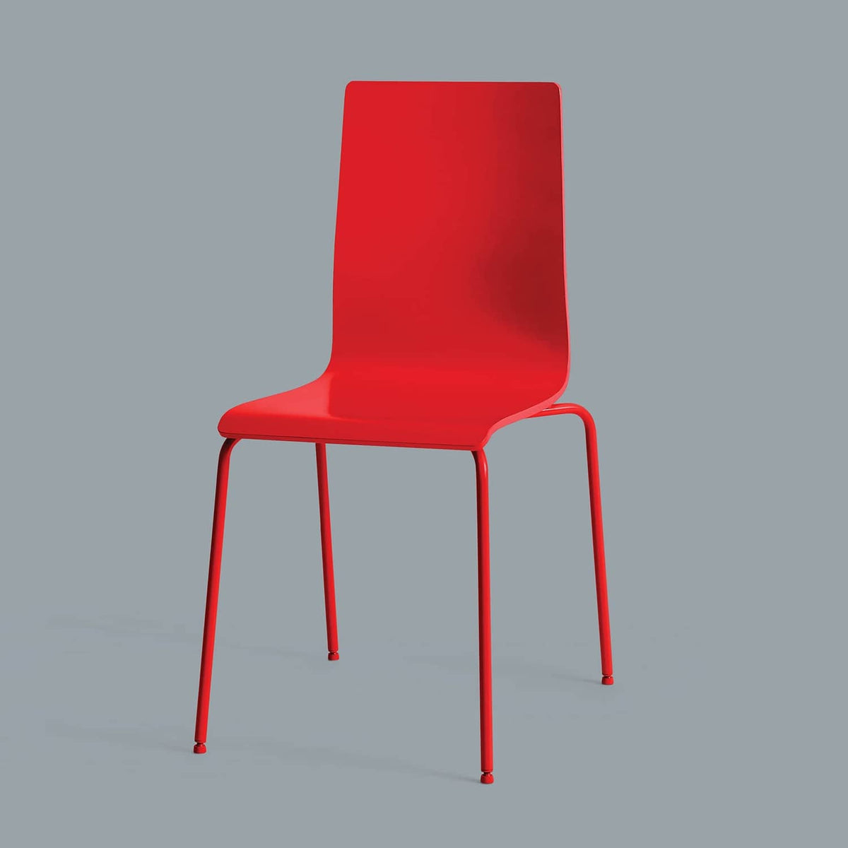 Red plastic chair with smooth glossy spray-painted finish.