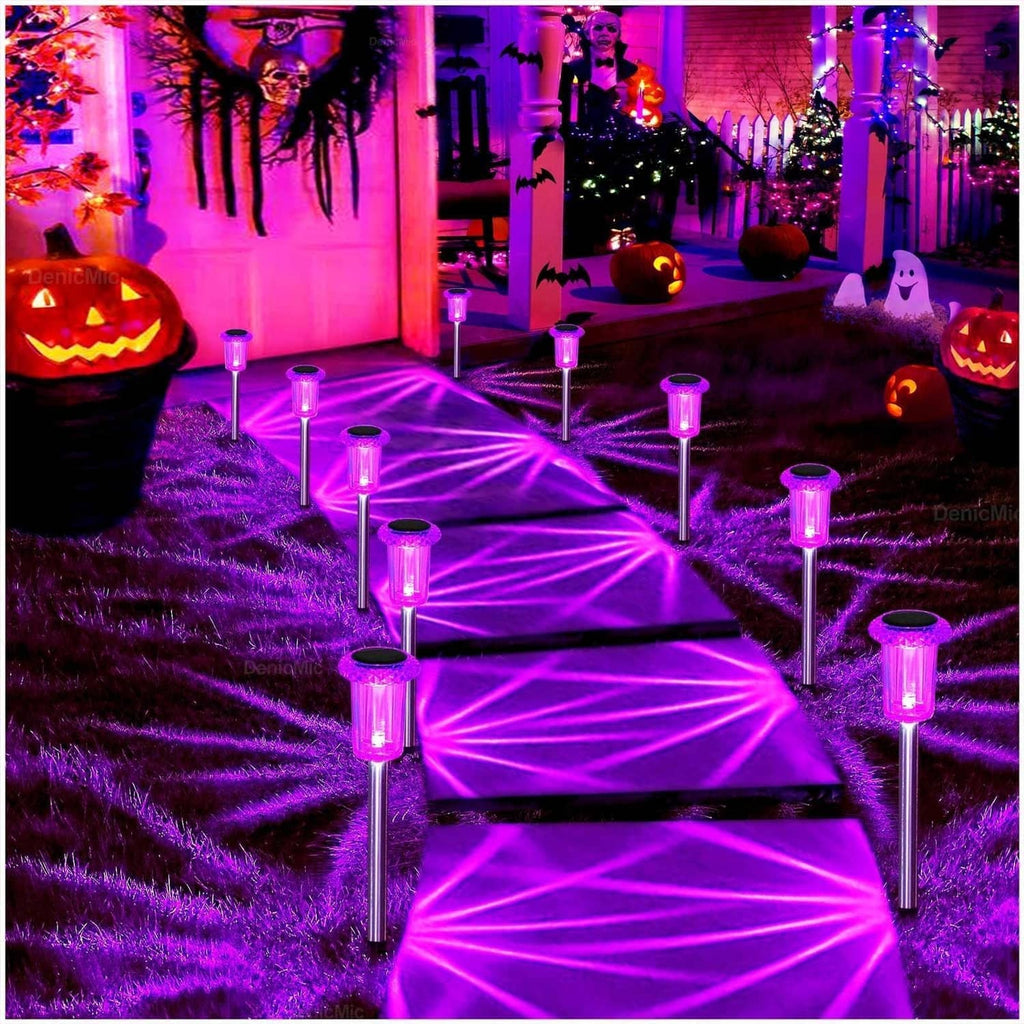 Outdoor solar LED stake lights, multiple purple points across lawn and garden walkway