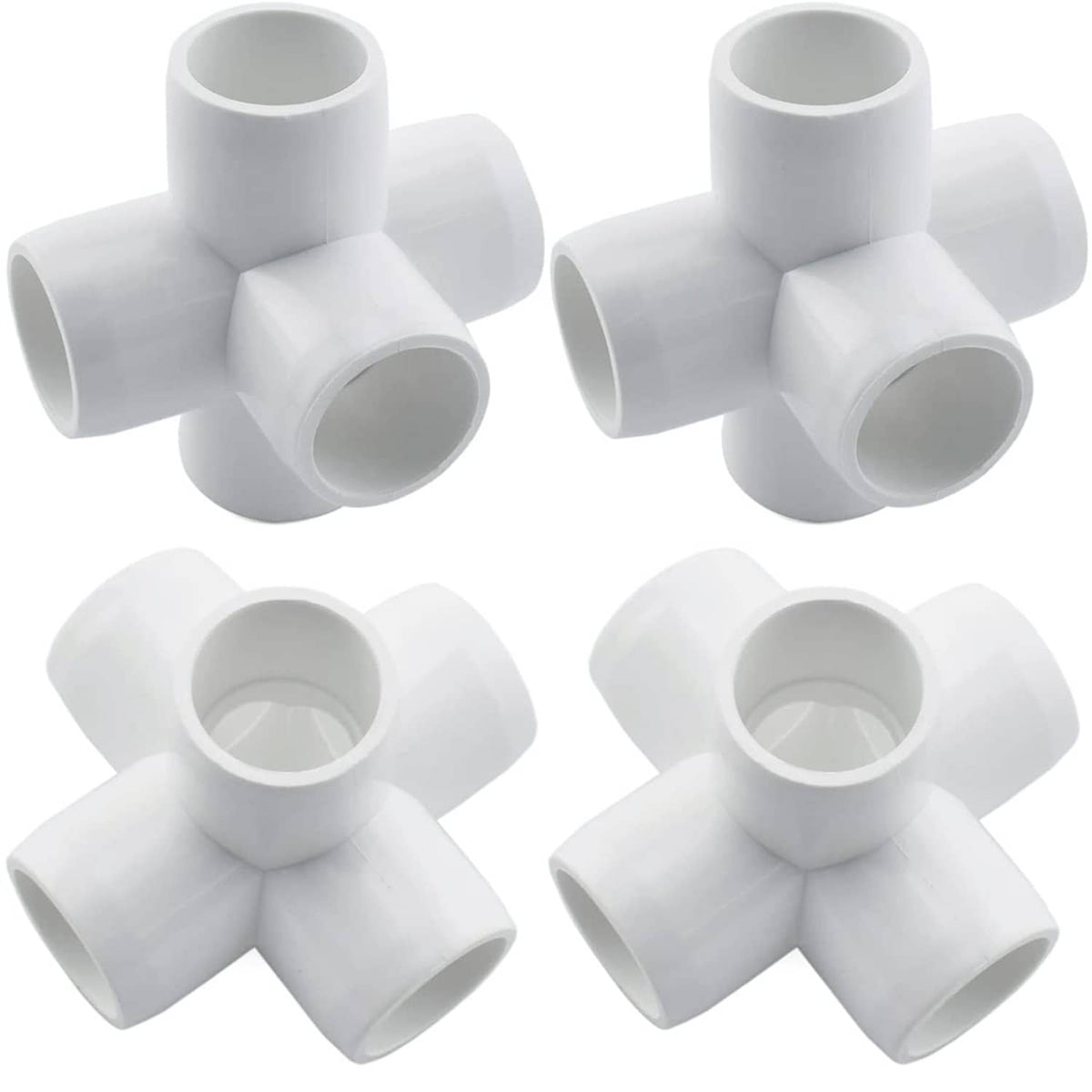 White 3/4 in PVC 4-way pipe fitting cross, four fittings close-up