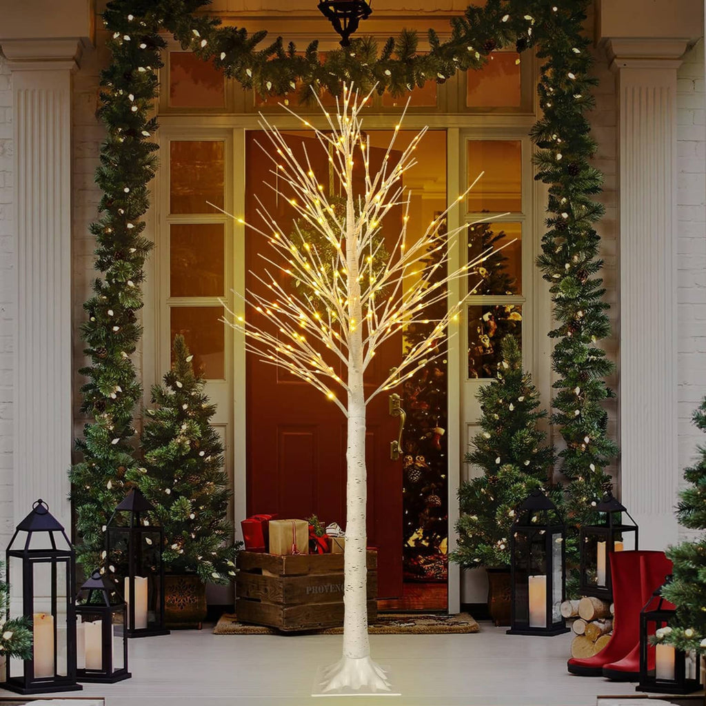 6 ft LED lighted birch tree decoration with warm white lights in holiday entry decor