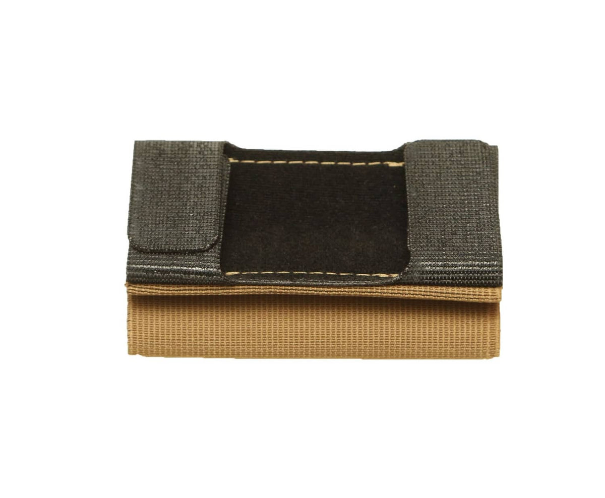 Black elastic pouch pocket with coyote brown backing and stitched edges