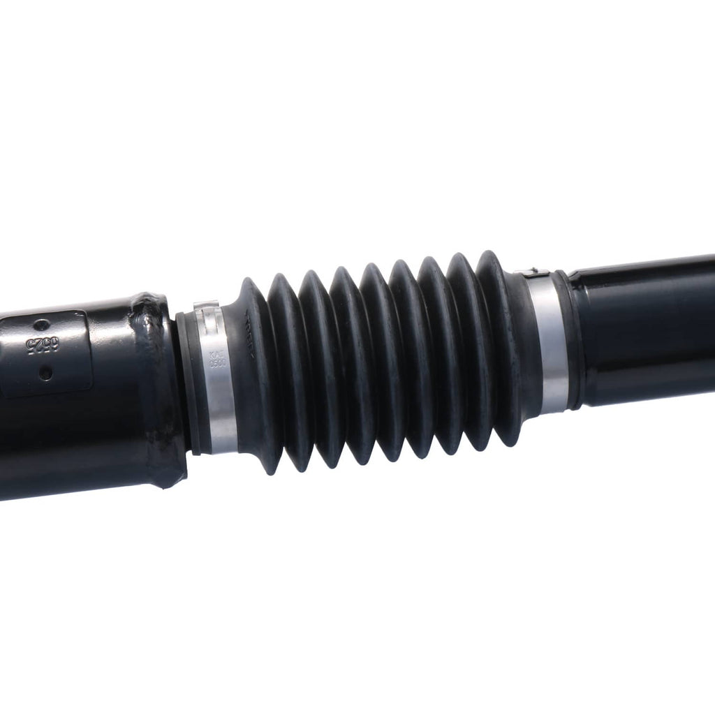 Front drive shaft assembly close-up of ribbed rubber boot and shaft coupling
