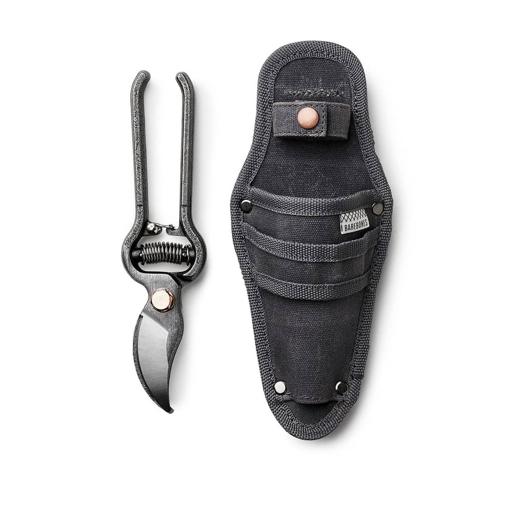 Japanese garden shears and closed black fabric sheath with copper-brown snap