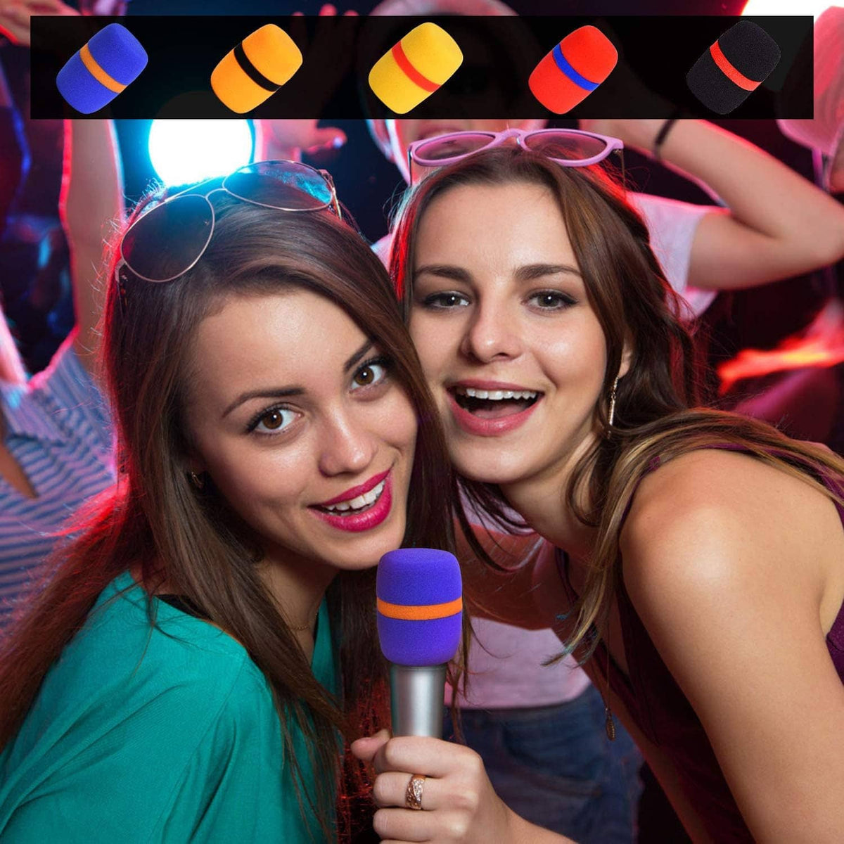 Blue foam microphone windscreen on handheld mic held by two smiling people