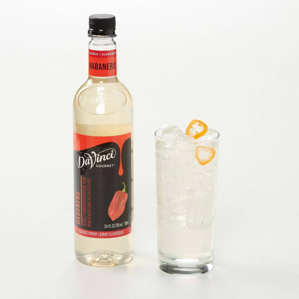 DaVinci Gourmet habanero syrup bottle with glass of iced drink and habanero garnish