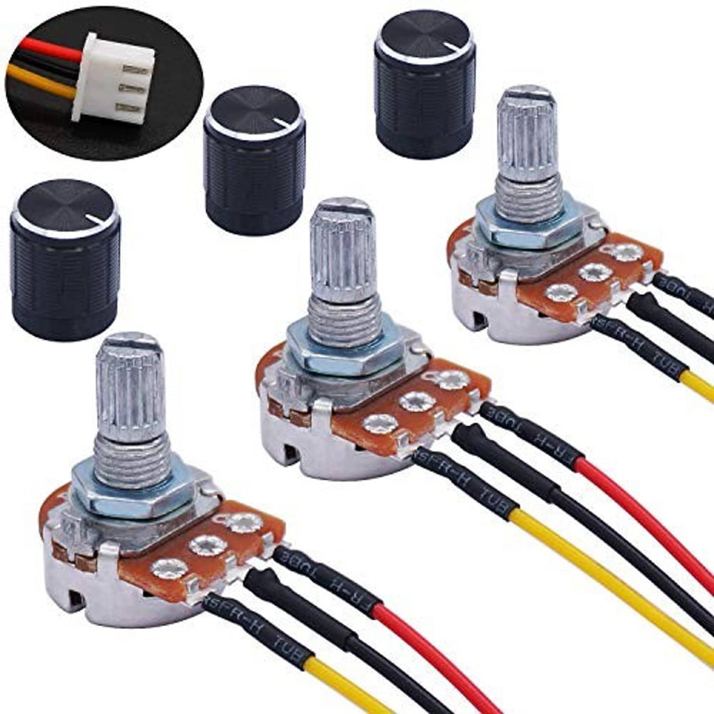 Three rotary potentiometers with black knobs, metal shafts, and orange circuit bases