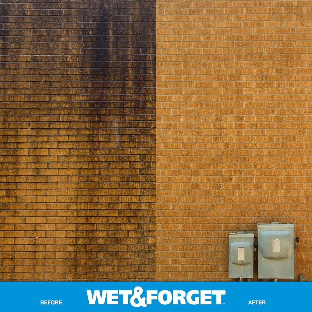 Brick wall with dark streaks and spots, with a cleaner-applied lighter section
