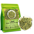 Loose Dragonwell green tea leaves in resealable pouch with bowl of leaves