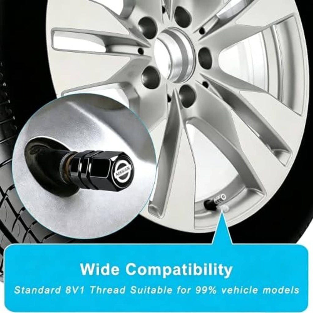 Black metal tire valve stem cap with Nissan logo on a car wheel valve
