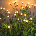 Warm white solar garden sway lights, black stems with round glowing bulbs