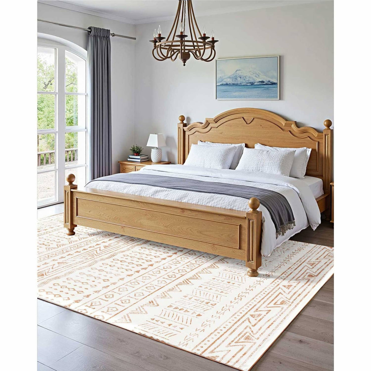 Beige geometric area rug with brown diamond and chevron designs under a bed