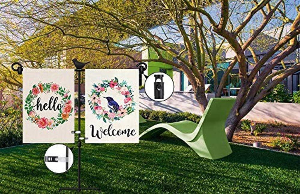 Black double garden flag stand holding two decorative wreath-style flags