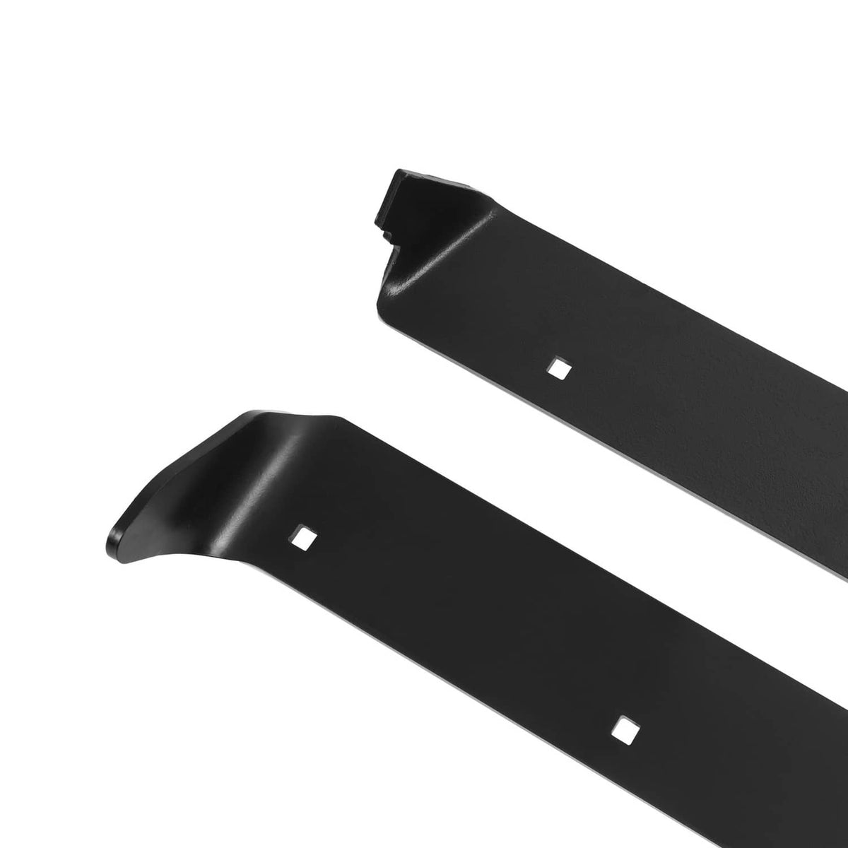 Overlapping view of two black snow plow cutting edge blades with mounting holes