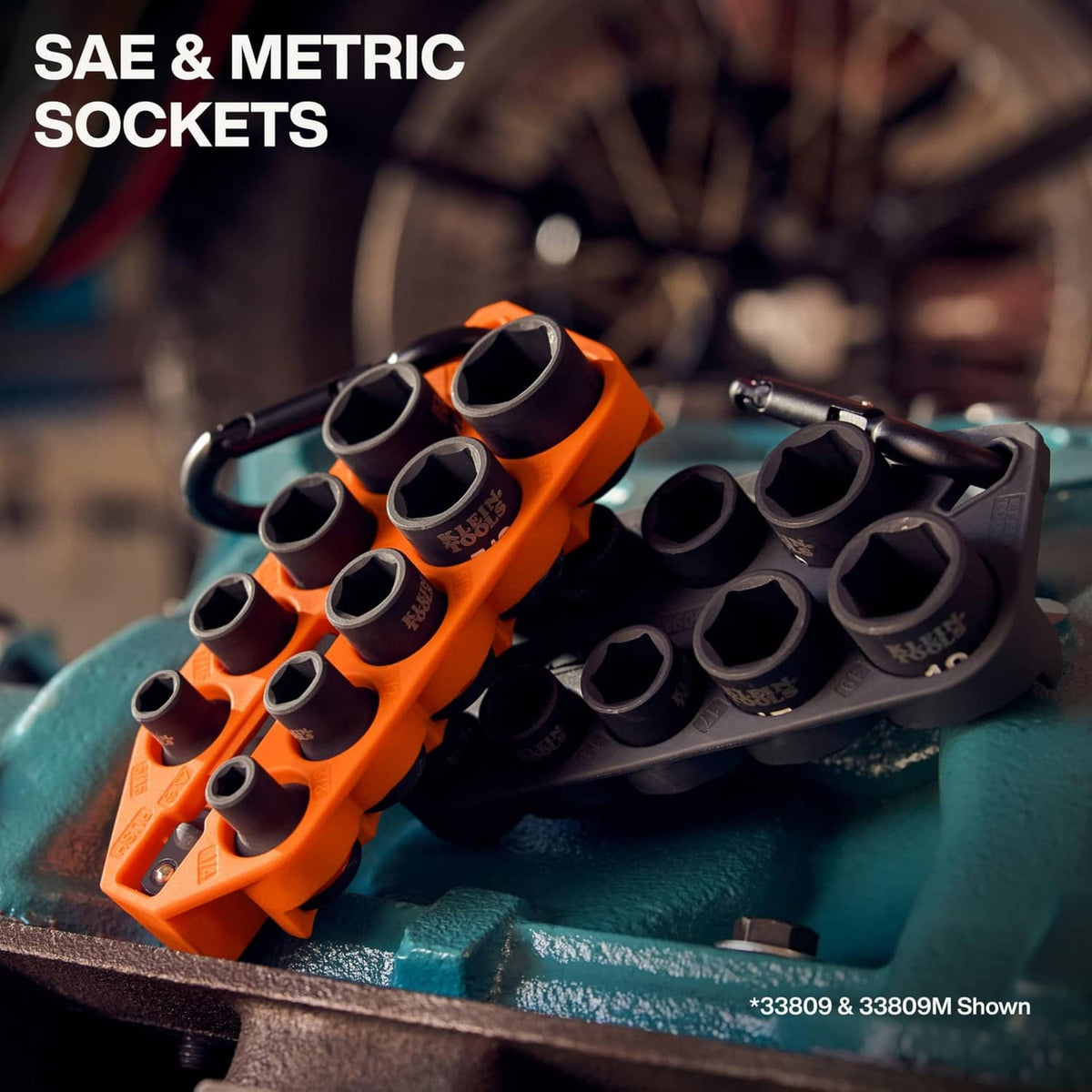 Socket set with orange and black trays holding hex sockets