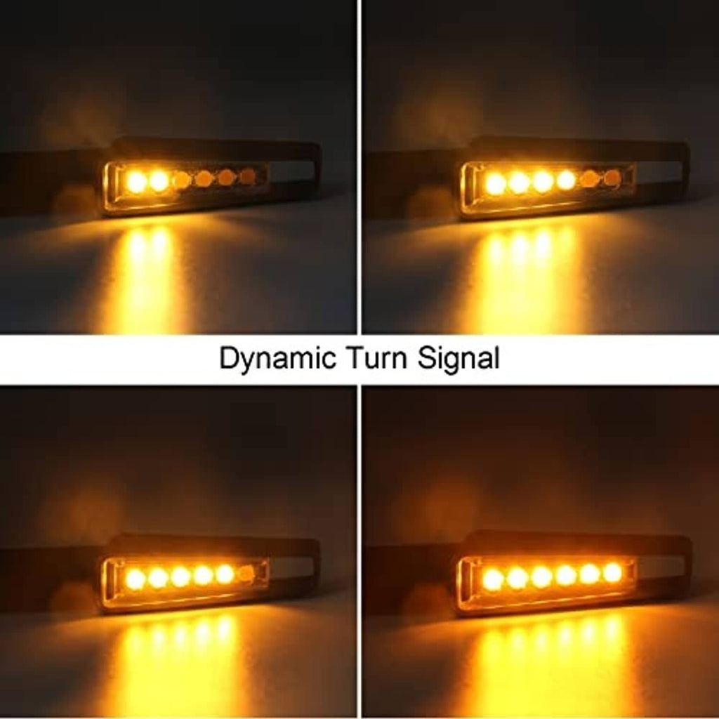 Motorcycle LED turn signal lights glowing amber, dynamic lighting effect, two lenses
