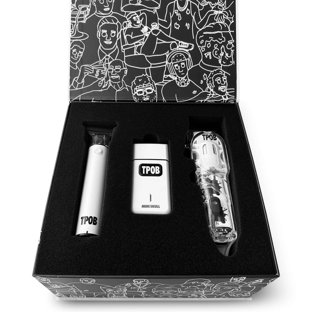Men's TPOB hair clipper trimmer set in black box with white base and clipper