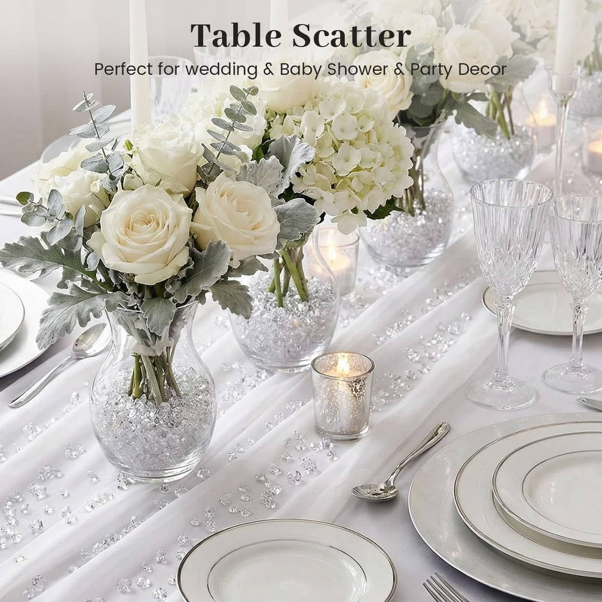 Clear faux rhinestone beads as table scatter around vases and dinnerware