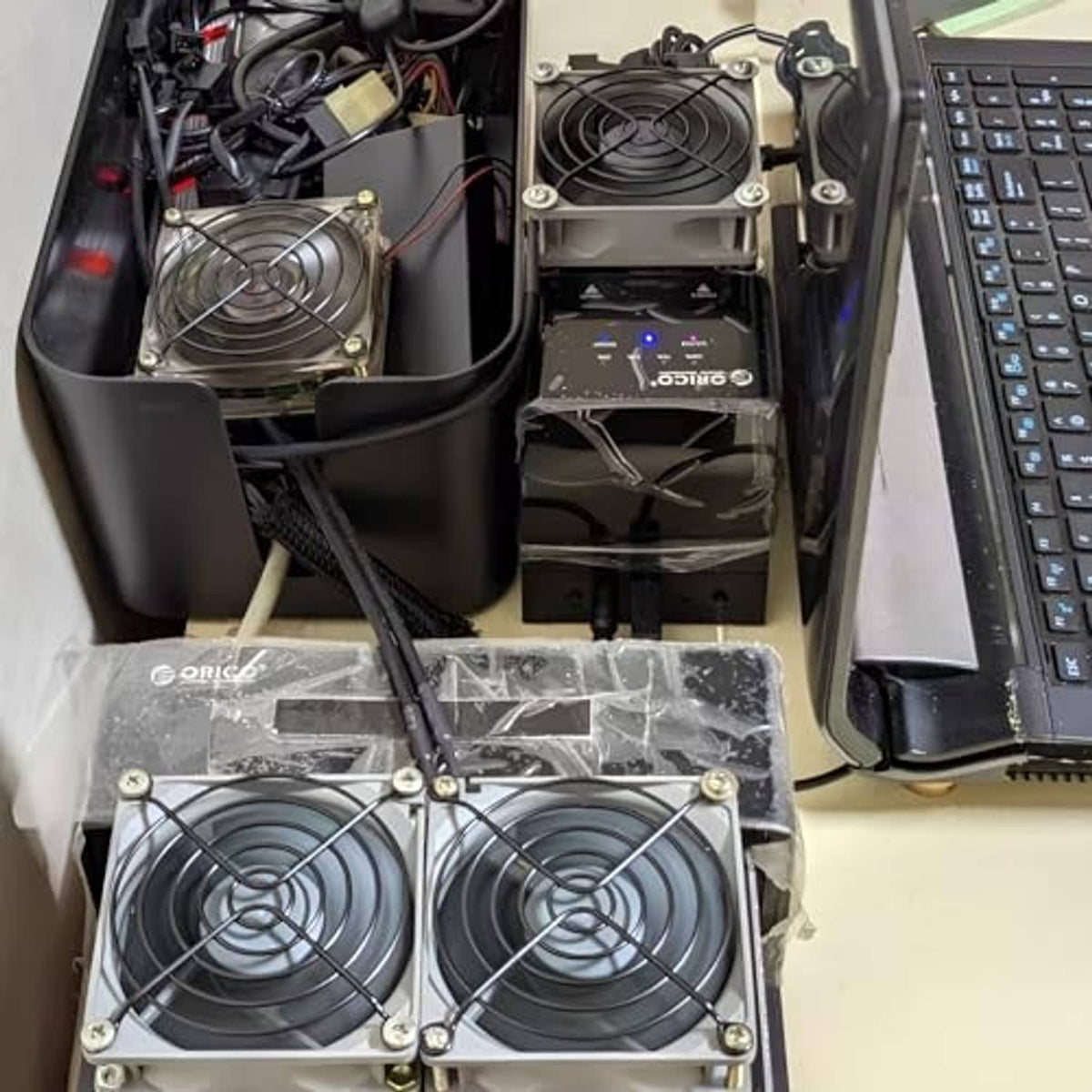 PC interior showing two fans connected to USB fan power adapter cable and connectors