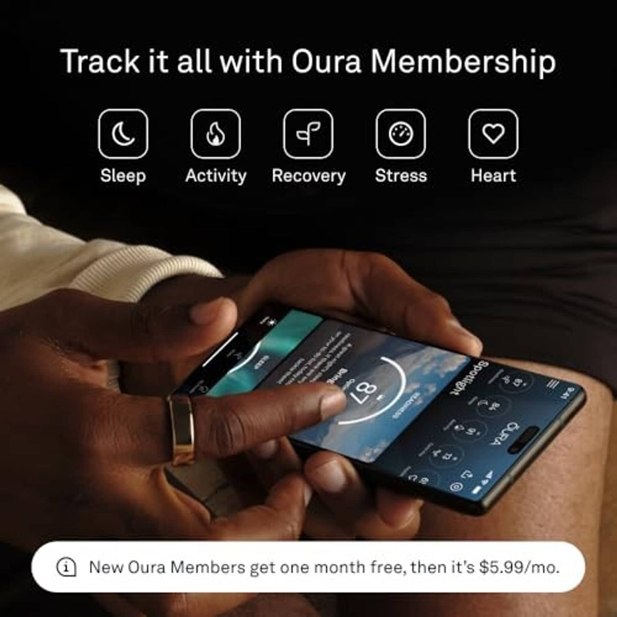 Oura black smart ring on a wrist while using a smartphone app
