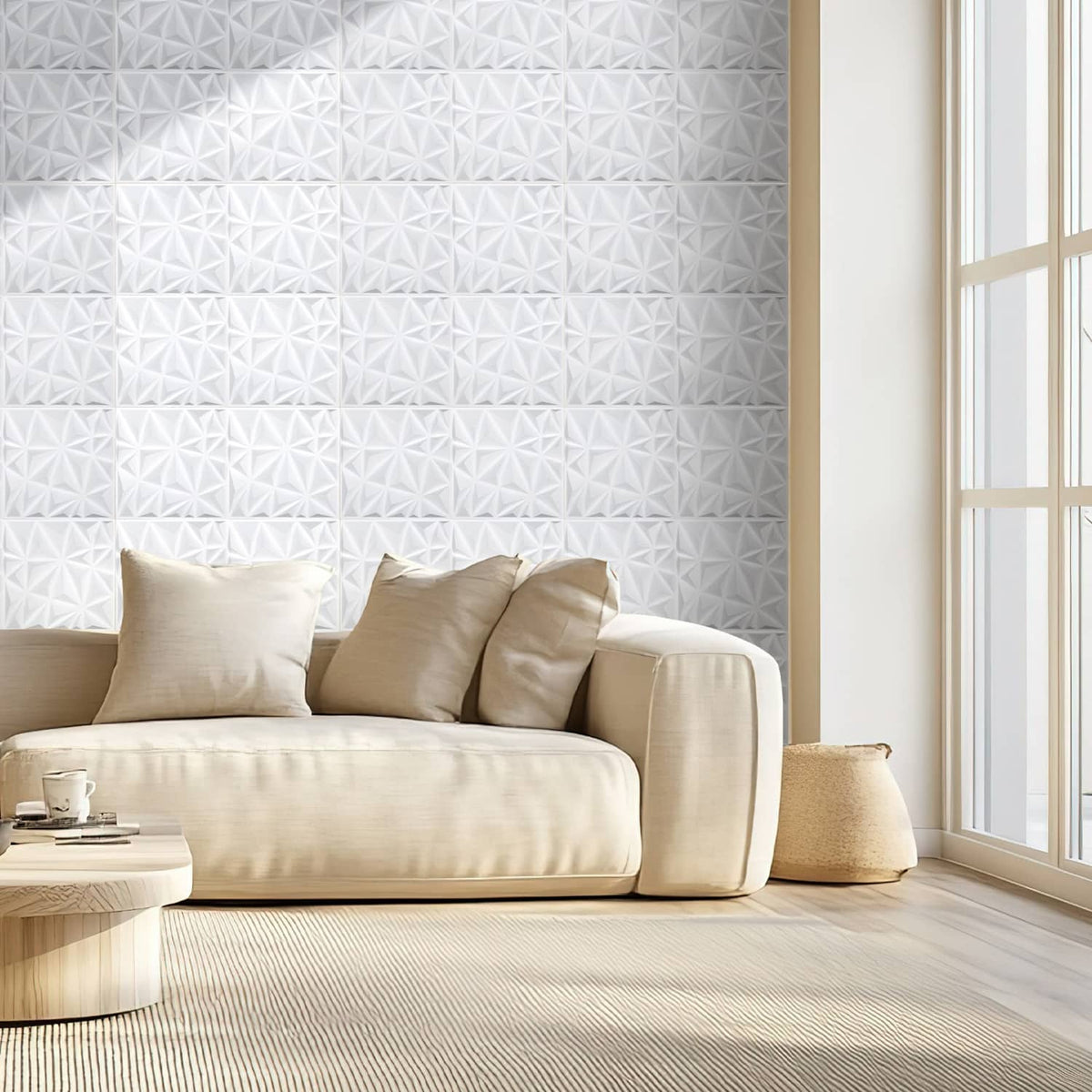 White 3D diamond relief panel wall behind a sofa, textured geometric surface