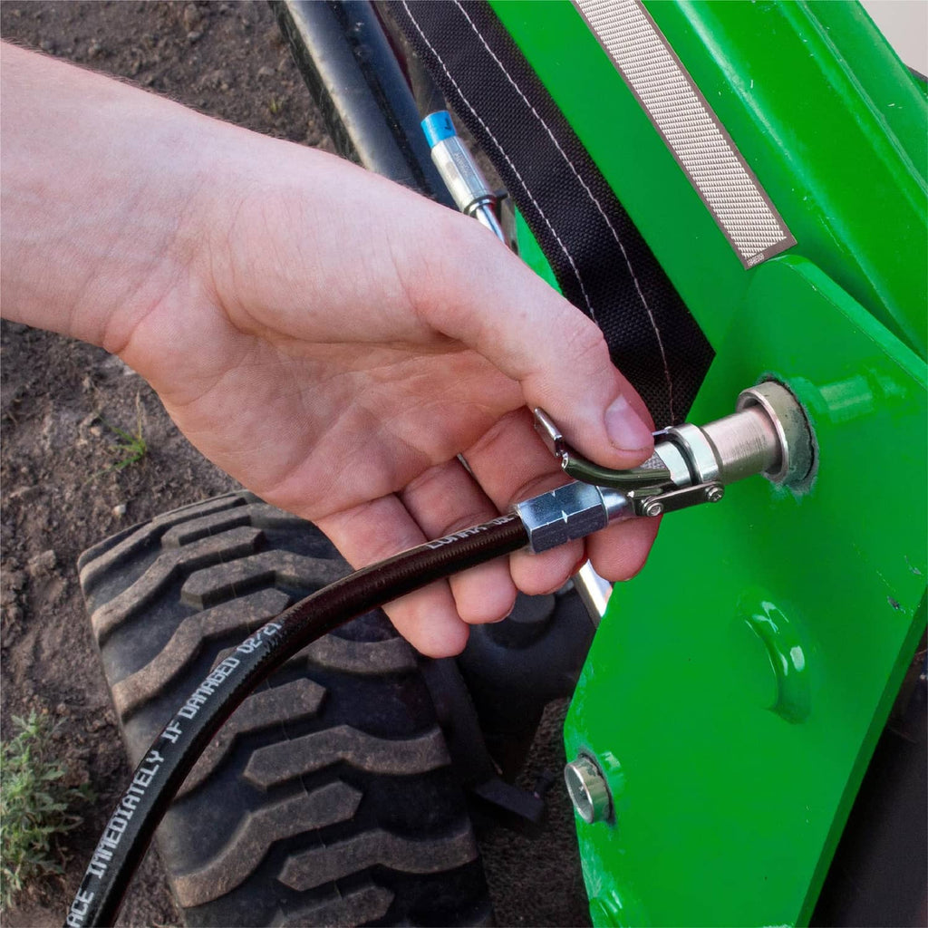 Quick release grease coupler connecting to a zerk fitting on equipment with lever