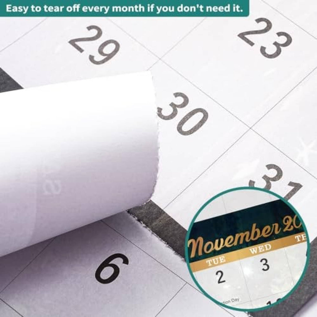 Tear-off calendar sheets with numbered days and a close-up of November 26