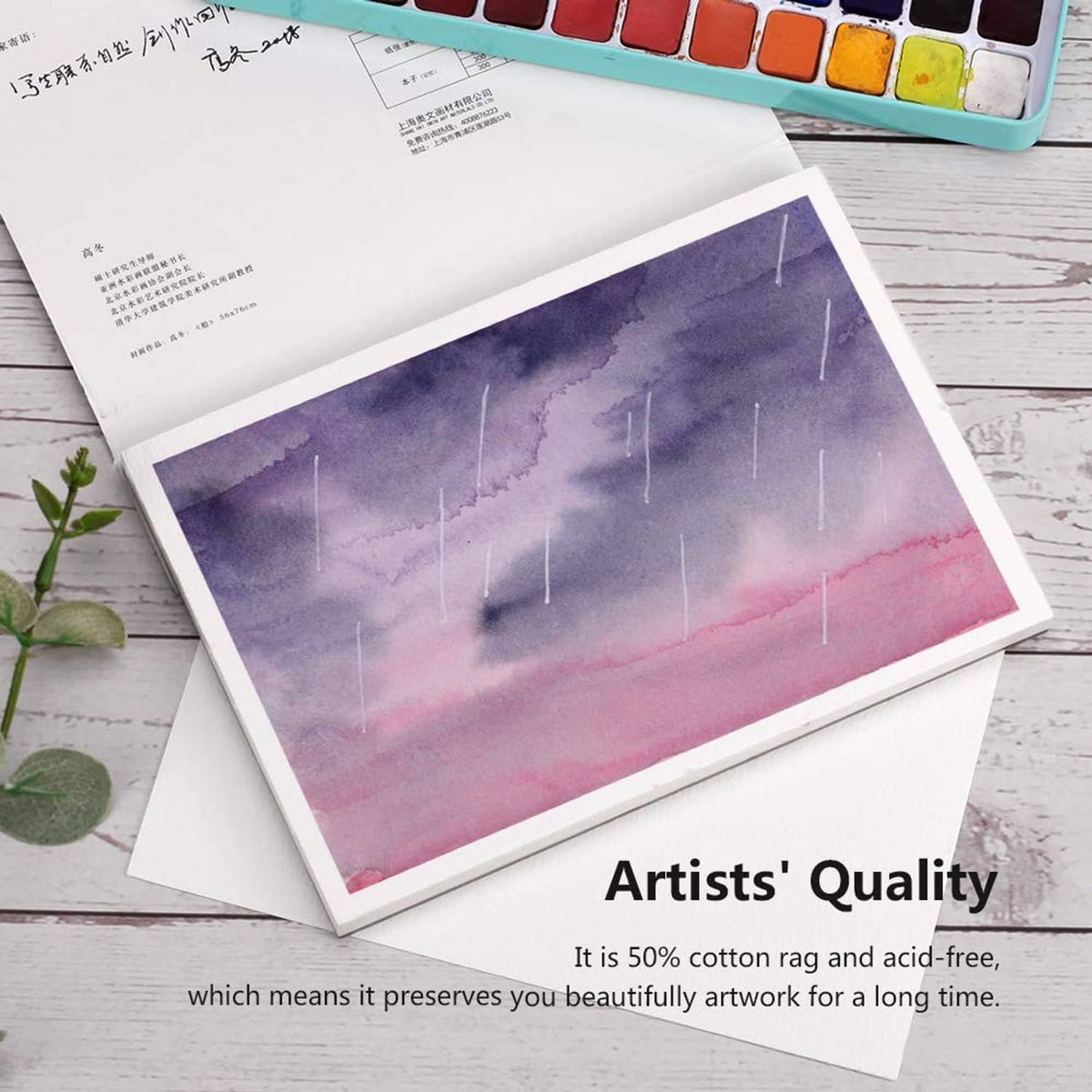 Watercolor paper block with purple watercolor artwork sample sheet