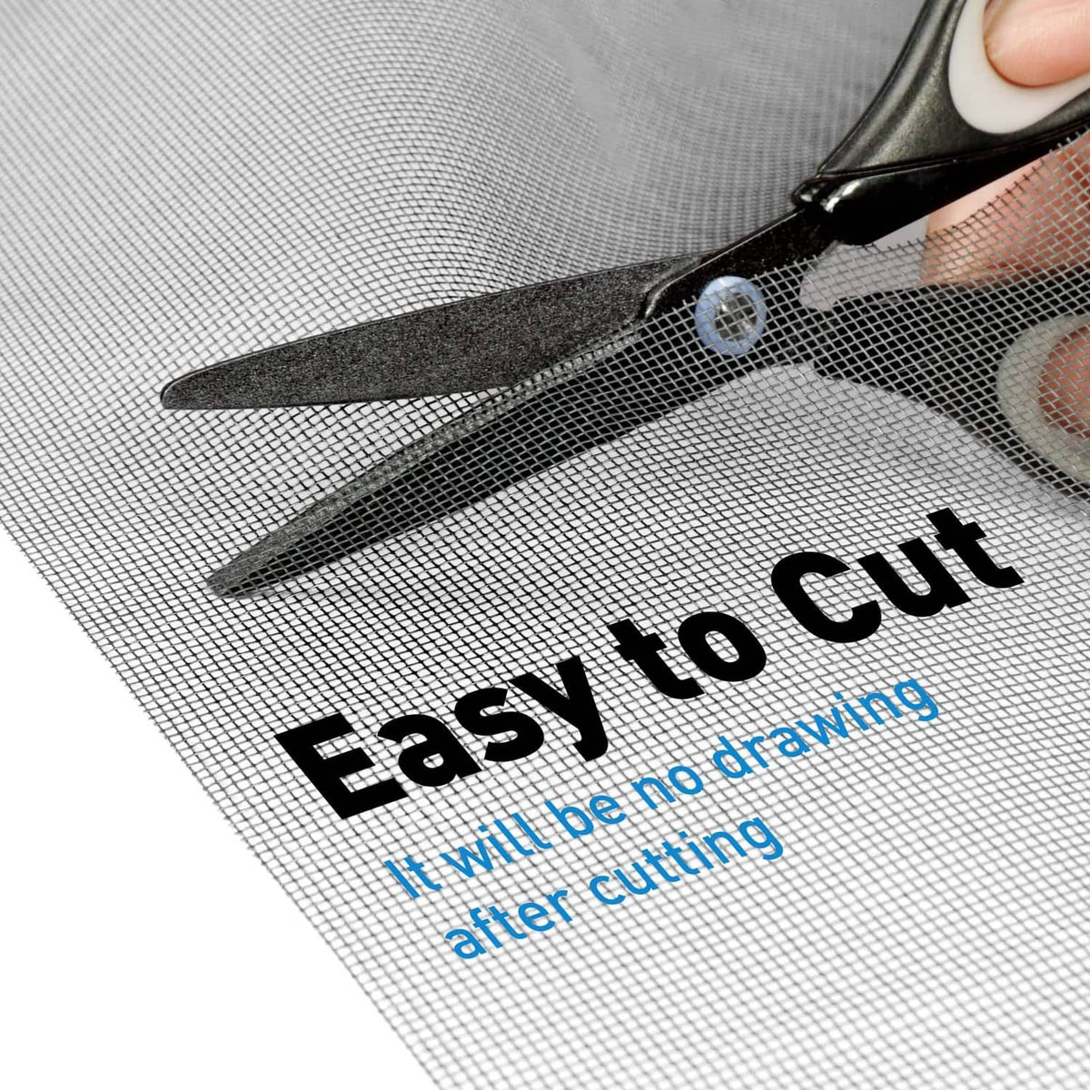 Black window screen mesh being cut with scissors