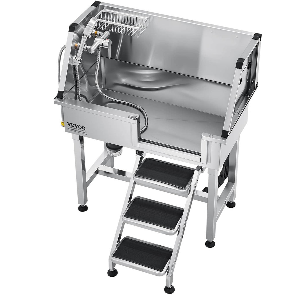 Large stainless steel dog bath tub with ramp-style stairs and drain outlet