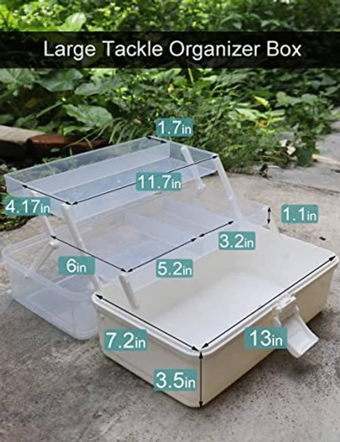 Clear-lid 3-layer tackle organizer box with multiple compartments on a surface