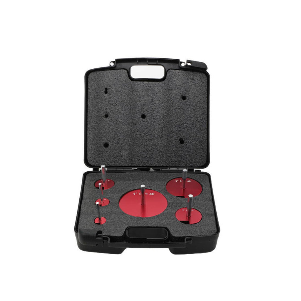 Pipe fitting reamer kit in open black case with red circular reamer heads