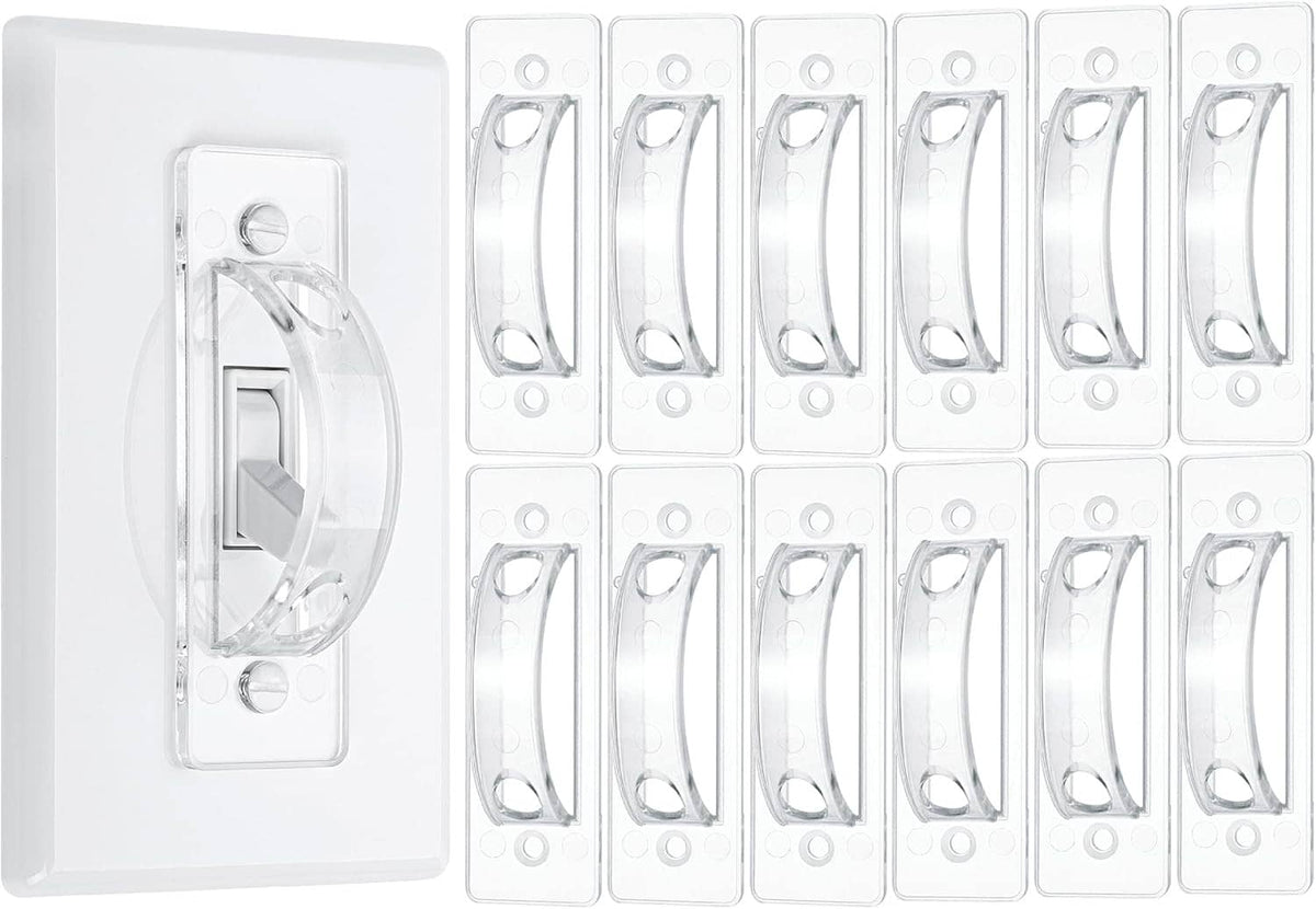 Clear toggle light switch guard covers displayed as multiple transparent pieces with screw holes