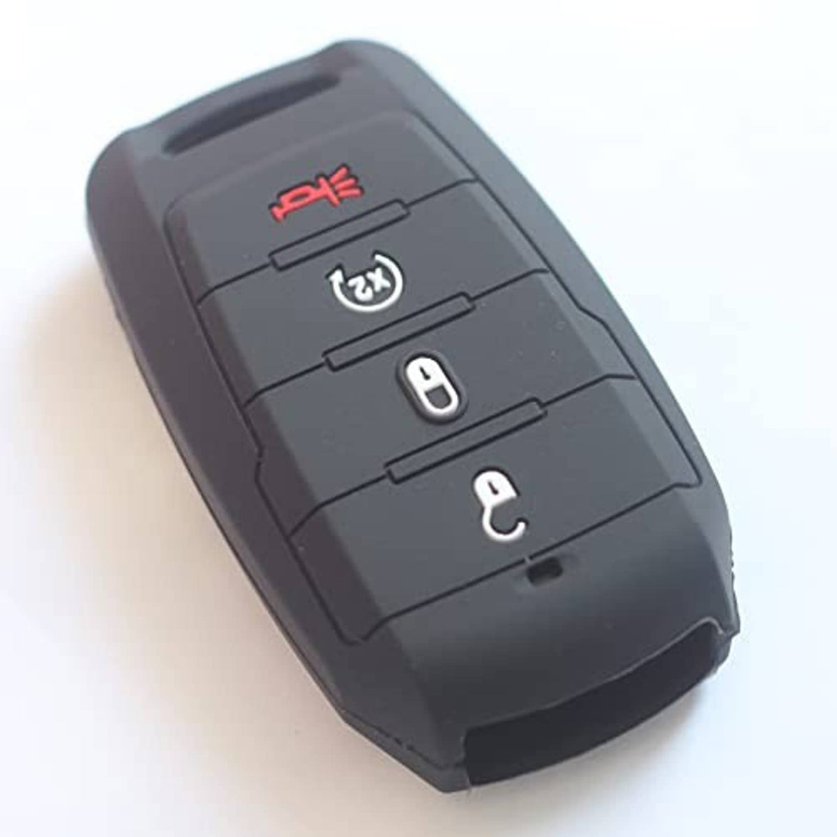 Black silicone key fob cover with red and white remote icons, angled view