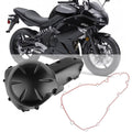 Black engine crank case cover with gasket and red sealing outline, motorcycle part.
