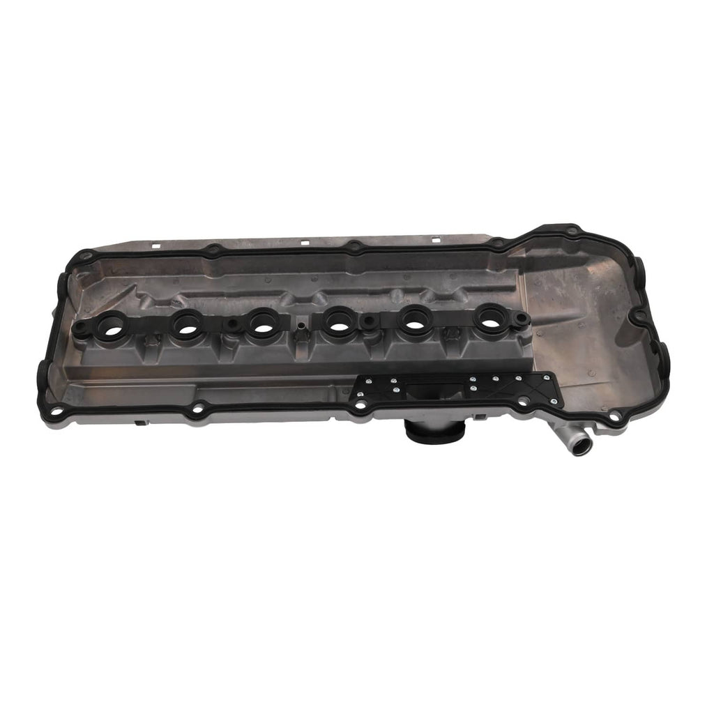 Aluminum valve cover underside with multiple round oil port openings and bolt holes