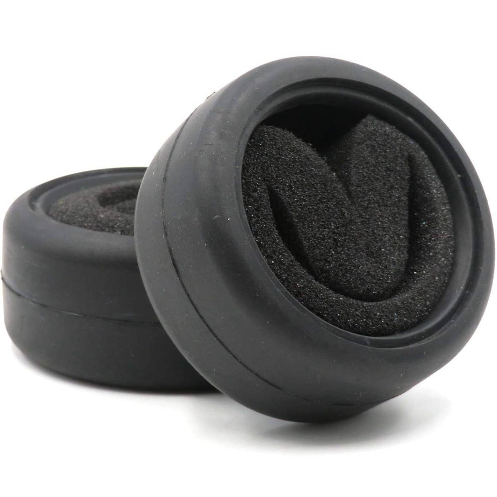Black RC on-road slick tire set with foam inserts, tilted side view