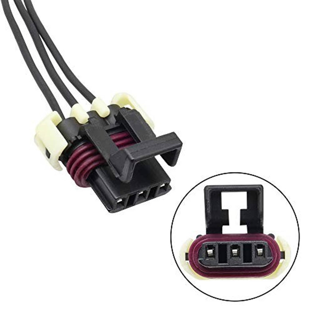 Engine camshaft sensor connector detail with maroon ribbed sleeve and black multi-pin plug