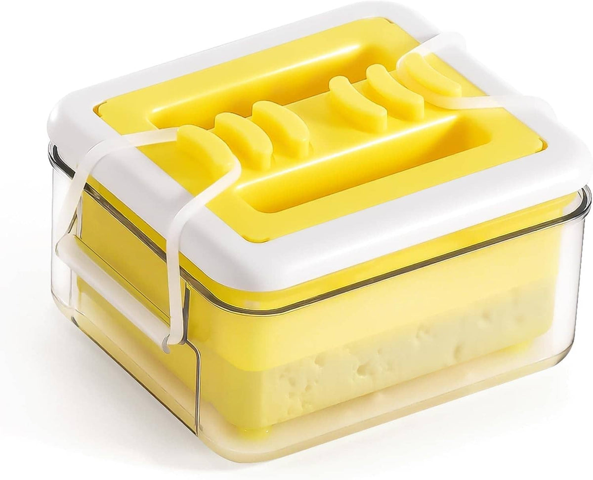 Tofu press with yellow tray and white lid over transparent base, clamp strap included